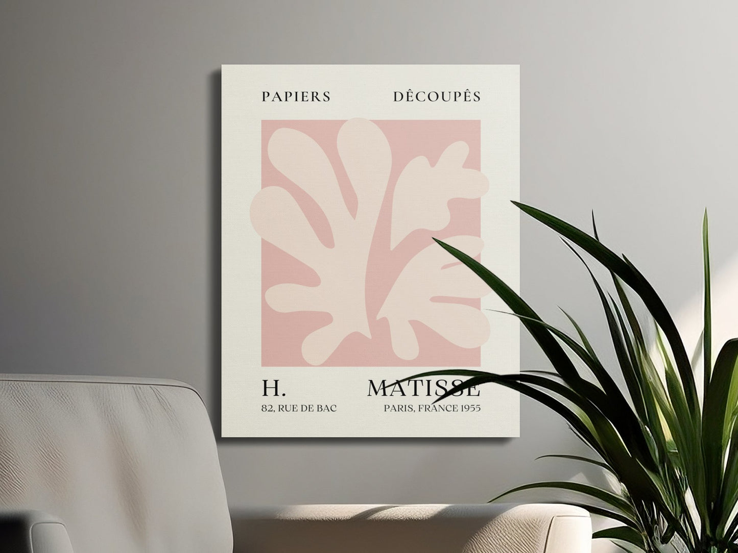 Henri Matisse reproduction canvas wrap on a gray wall with green plants and a beige chair, enhancing modern interior design aesthetics.
