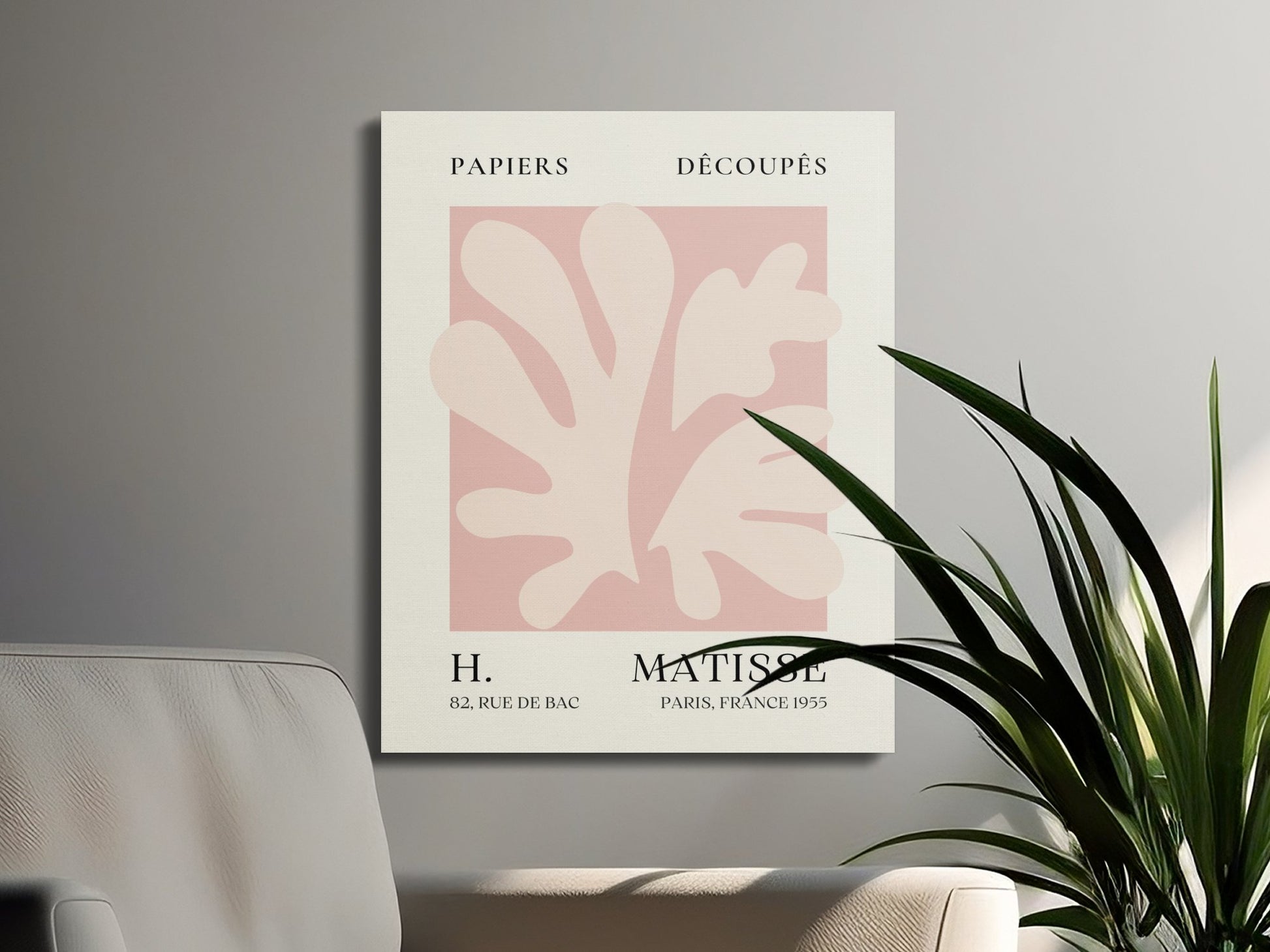 Henri Matisse reproduction canvas wrap on a gray wall with green plants and a beige chair, enhancing modern interior design aesthetics.