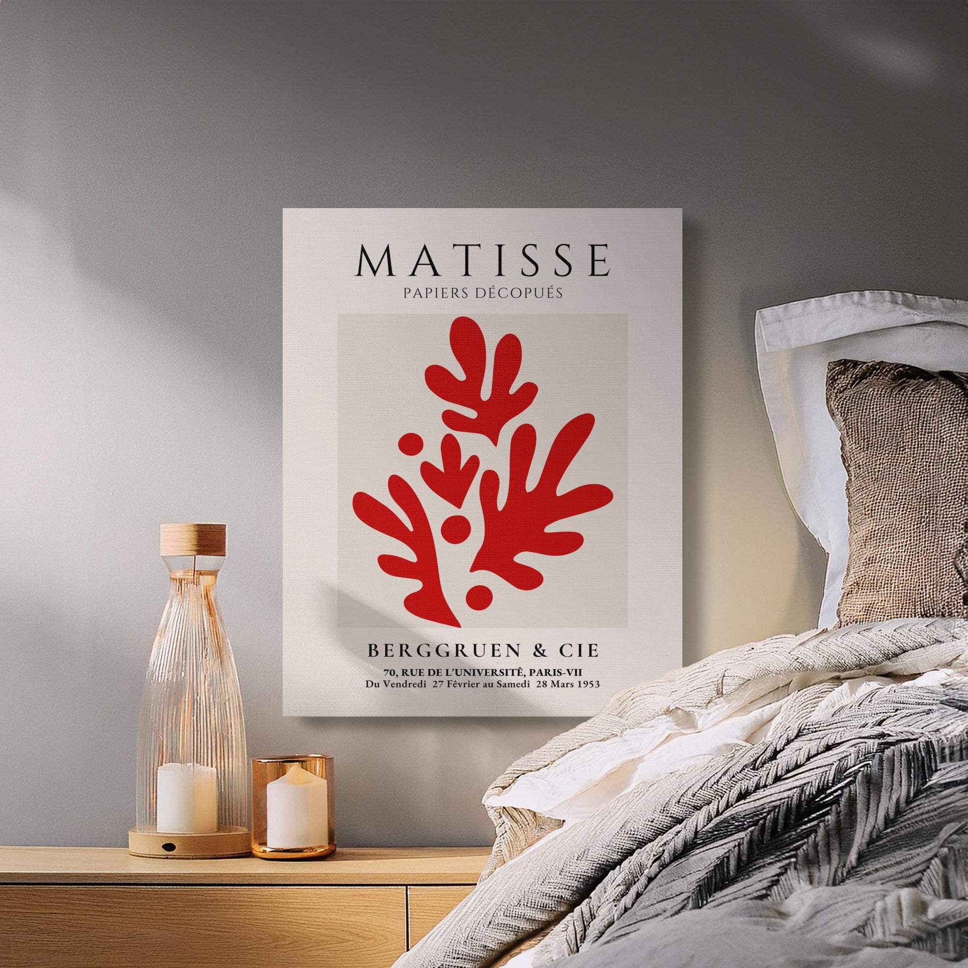 Henri Matisse canvas wall art with red Papiers Decoupes design, styled in a cozy bedroom with candles and neutral decor.