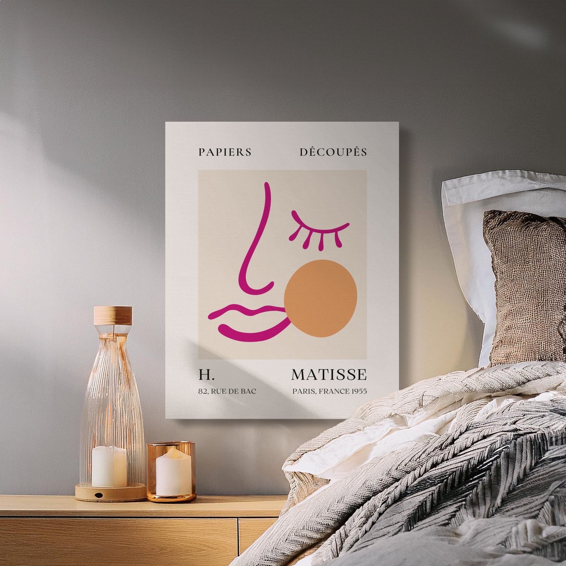 Henri Matisse wall art canvas styled in a cozy bedroom setting, featuring a minimalist face design and text 'Rue de Bac, Paris 1955.'