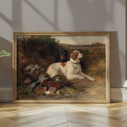 Hunting dogs and game birds artwork in a gold frame, leaning against a wall with natural light highlighting its vintage charm.