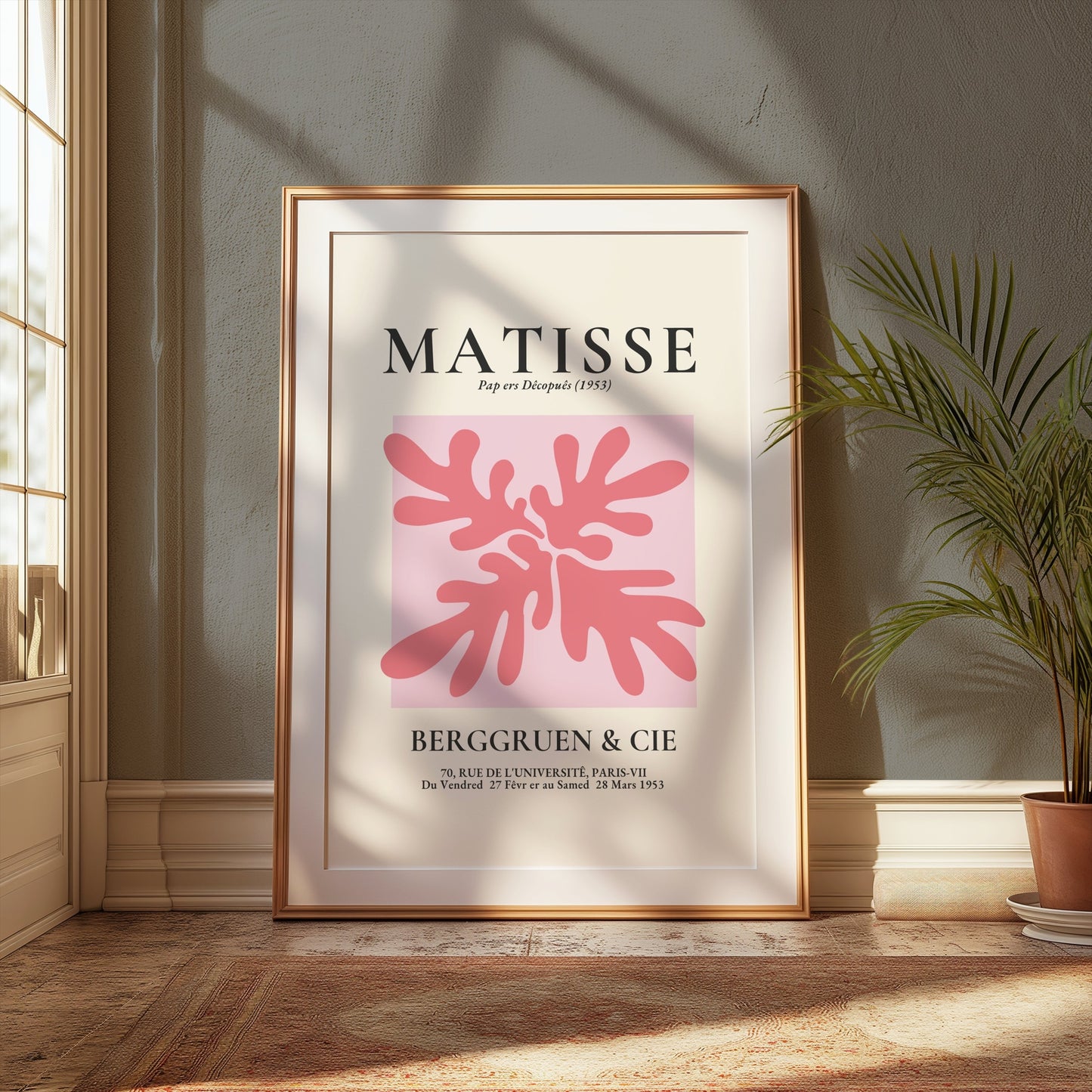 Matisse Art Exhibition Paris 1953 poster in a wooden frame, displayed in a cozy room with natural light and plants.