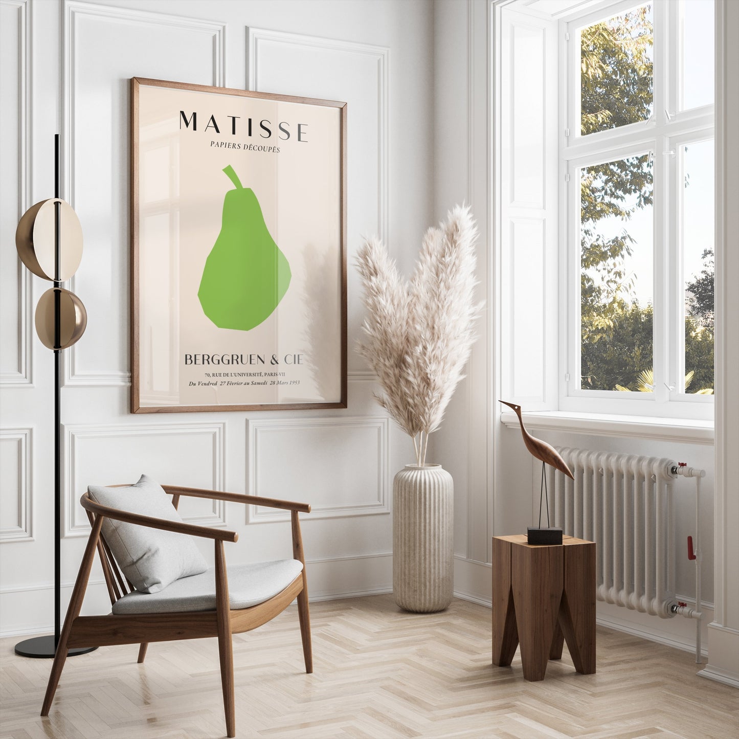 Framed Matisse green pear art print displayed in a bright, modern living room with neutral tones and minimalist decor.