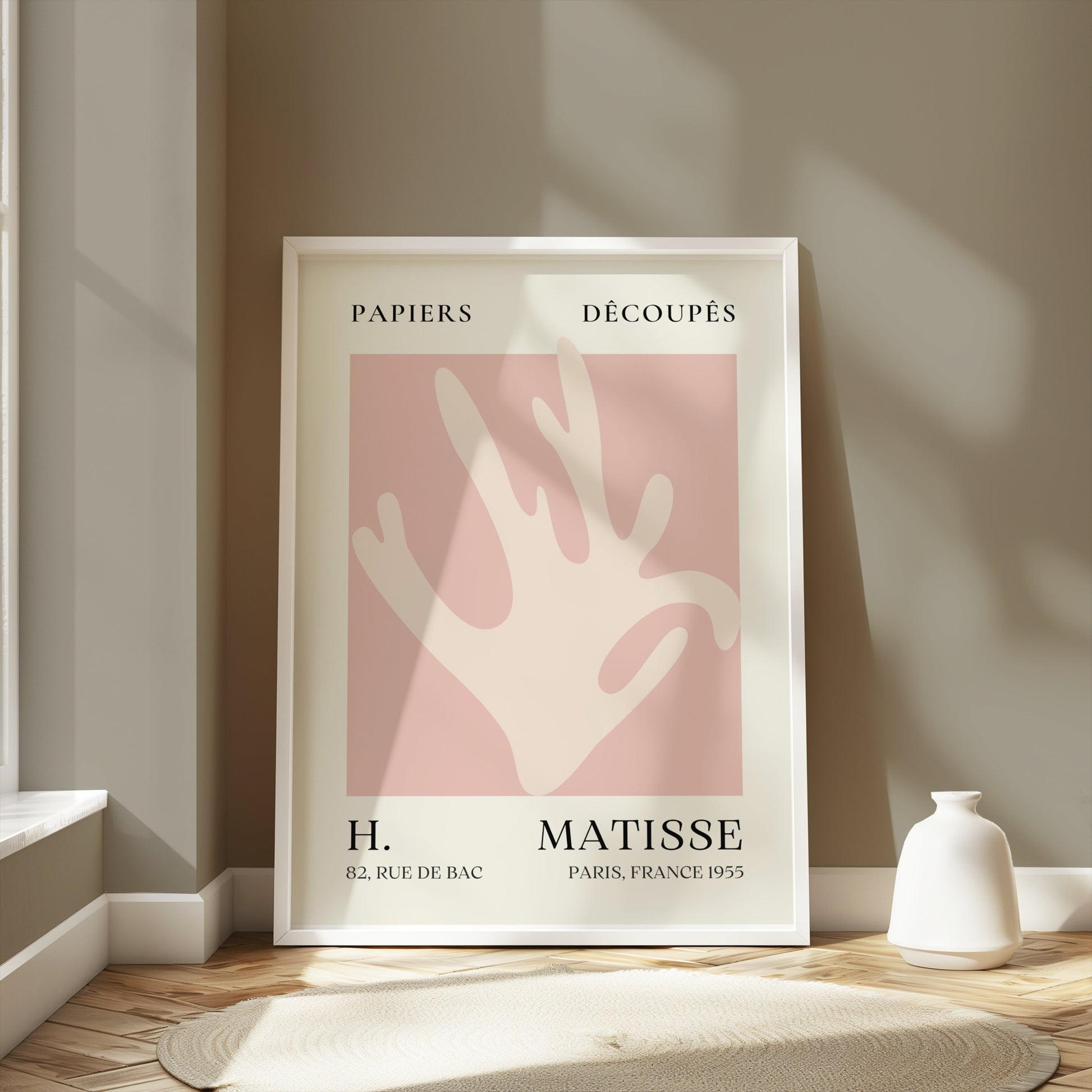 Framed Matisse Coral Hand Inspired Paris Art Poster displayed in a sunlit room, perfect for enhancing minimalist and modern interiors.