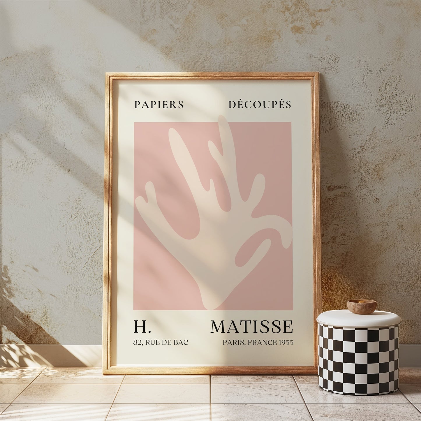 Matisse Coral Hand Inspired Paris Art Poster in a wooden frame, styled against a textured wall with soft natural lighting for vintage decor.