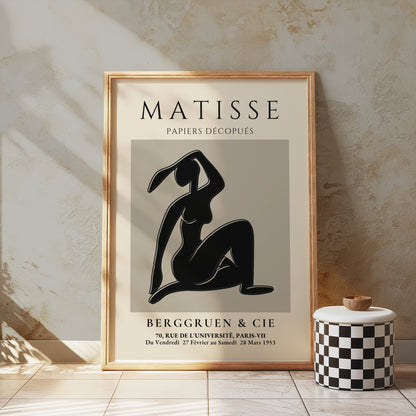 Matisse Exhibition Papiers Decoupés Berggruen Poster in a wooden frame, styled on a textured wall for vintage-inspired decor.