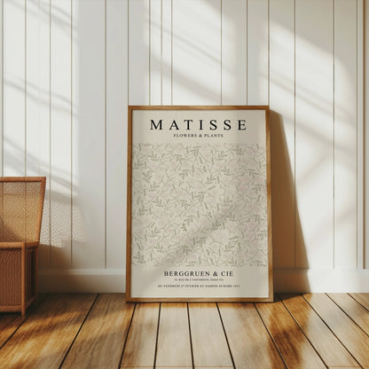 Matisse Flowers and Plants Berggruen and Cie poster in a wooden frame, styled in a bright, minimalist room with natural light.