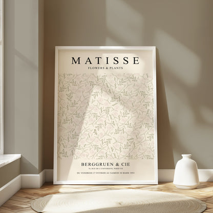 Matisse Flowers and Plants Berggruen and Cie poster in a white frame, styled in a modern room with neutral tones and natural light.