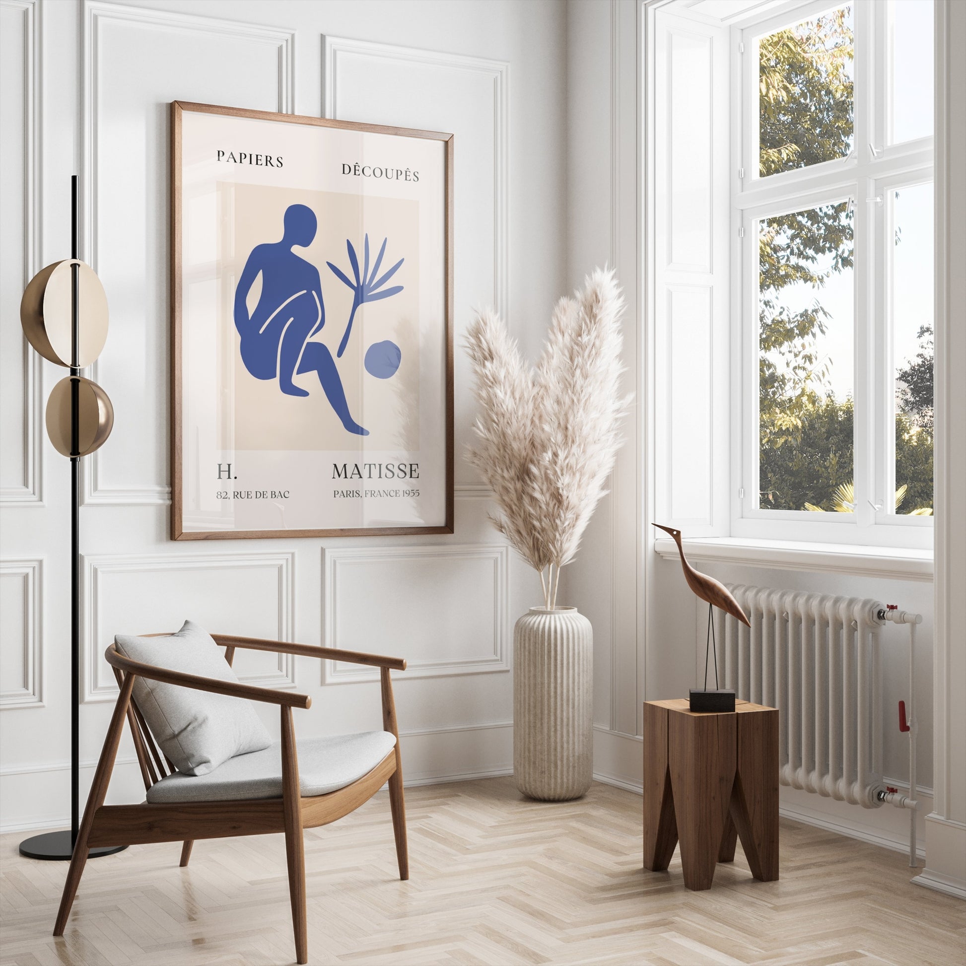 Matisse inspired modern art poster in a wooden frame, styled in a bright living room with pampas grass and mid-century furniture.