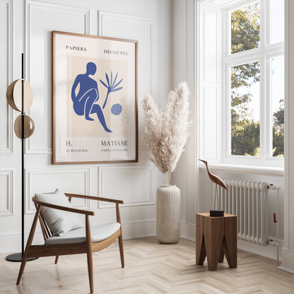 Matisse inspired modern art poster in a wooden frame, styled in a bright living room with pampas grass and mid-century furniture.