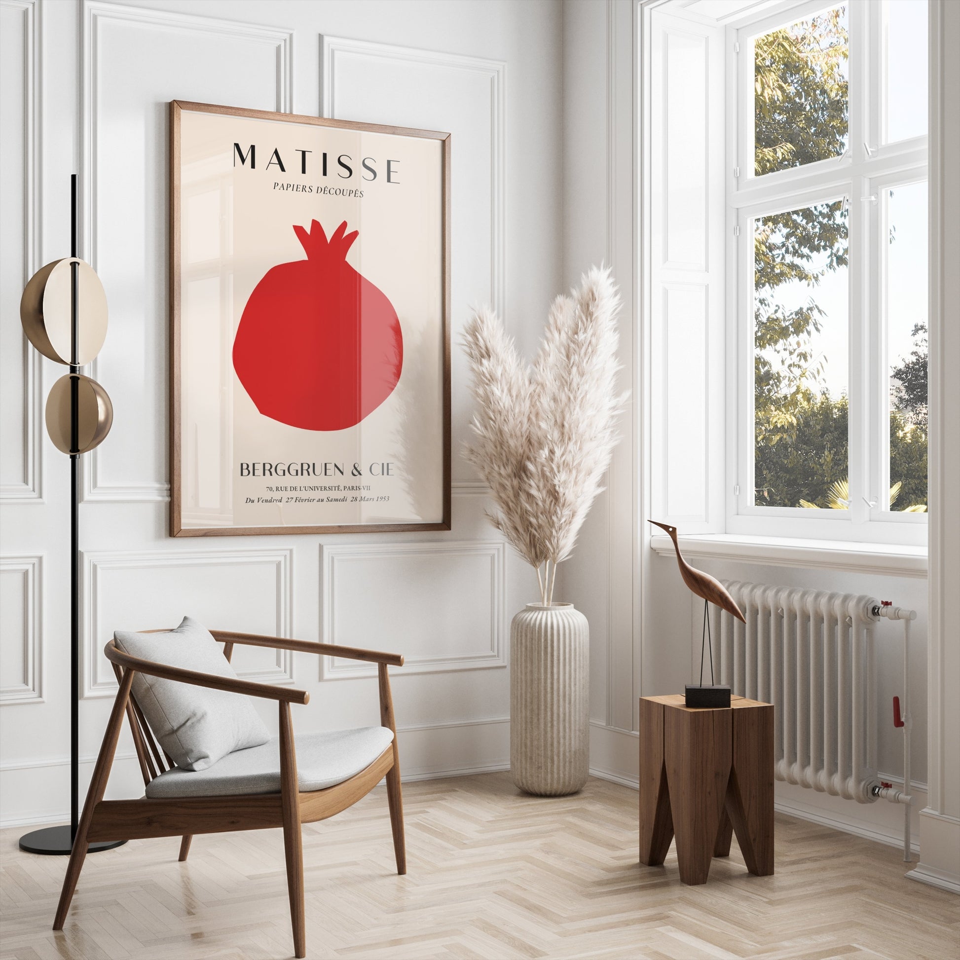 Matisse Papiers Decoupes Berggruen & Cie poster in a wooden frame displayed in a bright, modern living room with minimalist decor.