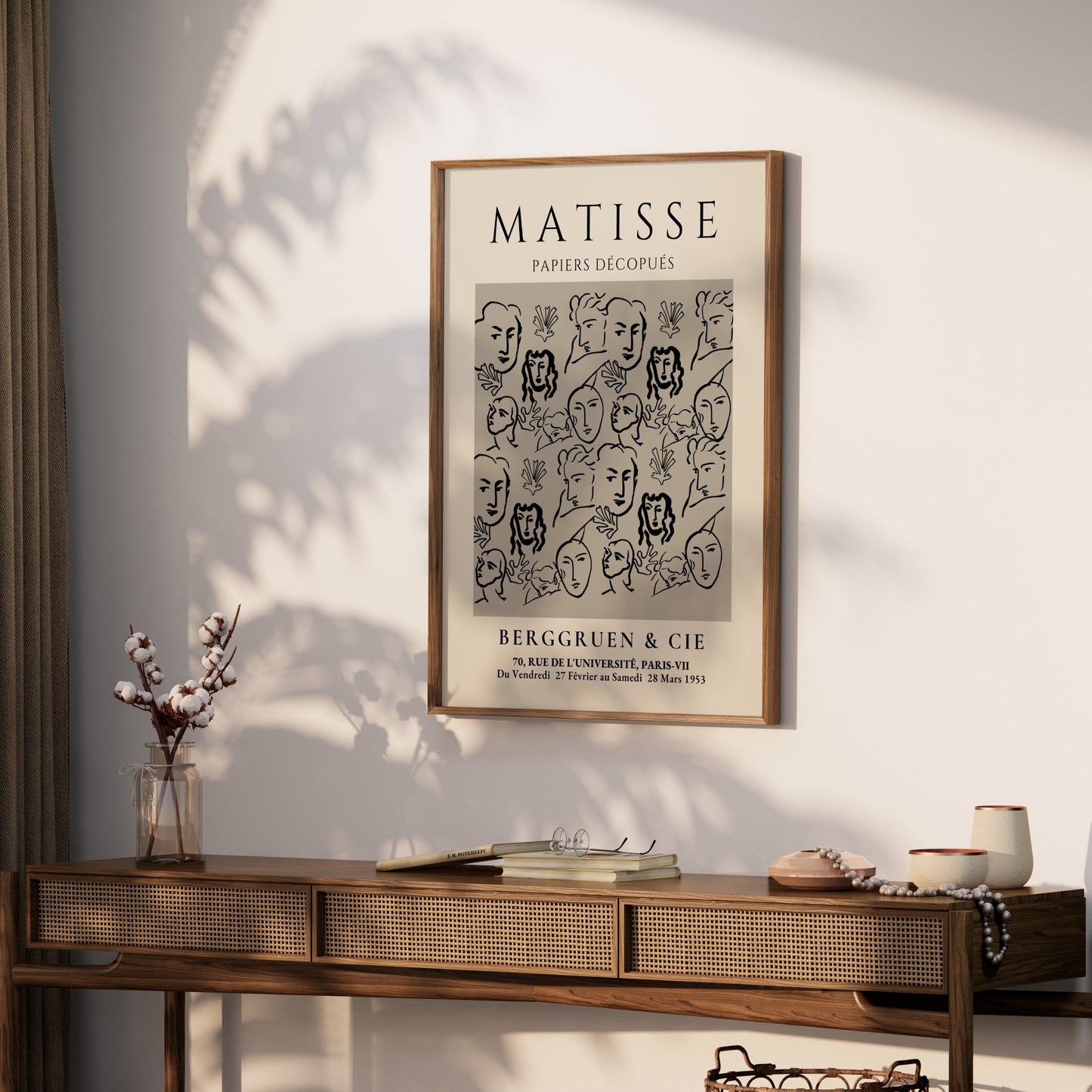 Framed Matisse Papiers Découpés exhibition poster displayed on a wooden console table with decor, perfect for modern home interiors.