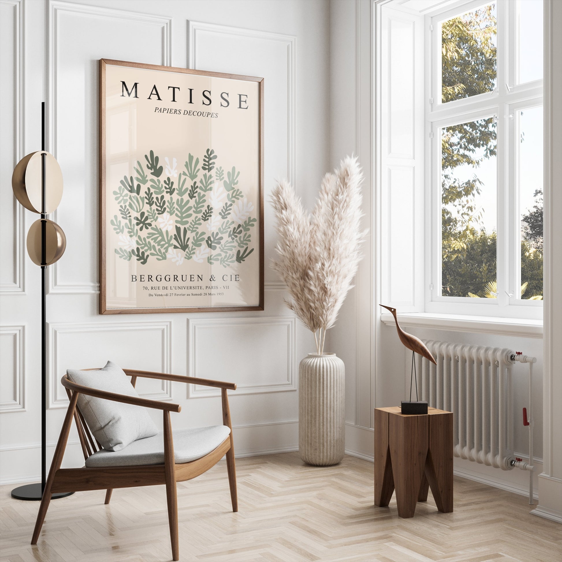 Matisse Papiers Decoupes poster framed and styled in a modern living room with neutral tones, pampas grass, and minimalist furniture.