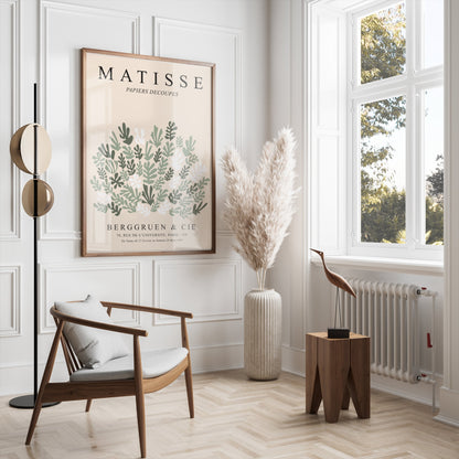 Matisse Papiers Decoupes poster framed and styled in a modern living room with neutral tones, pampas grass, and minimalist furniture.