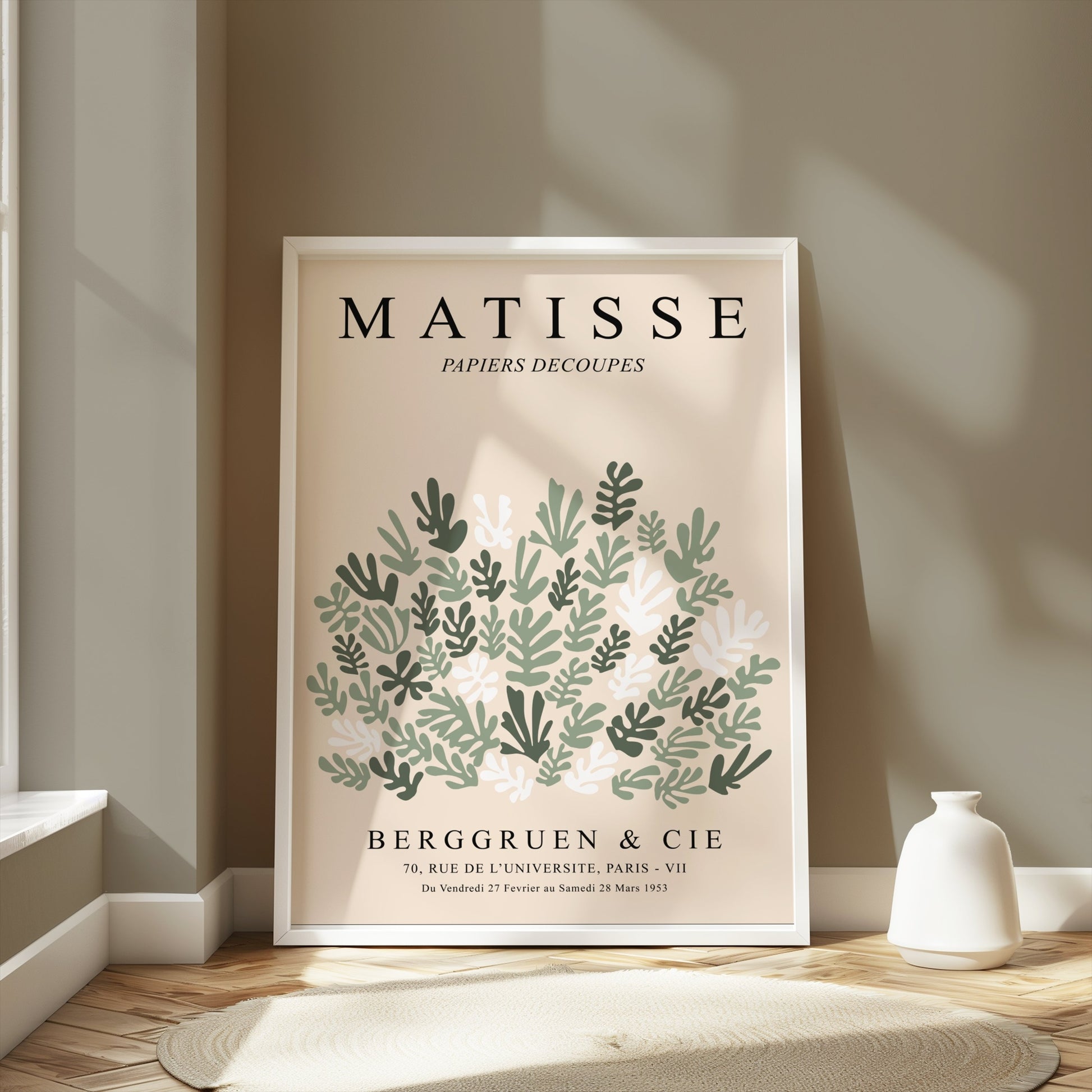 Matisse Papiers Decoupes poster in a white frame, styled in a modern room with soft natural light and minimalist decor elements.