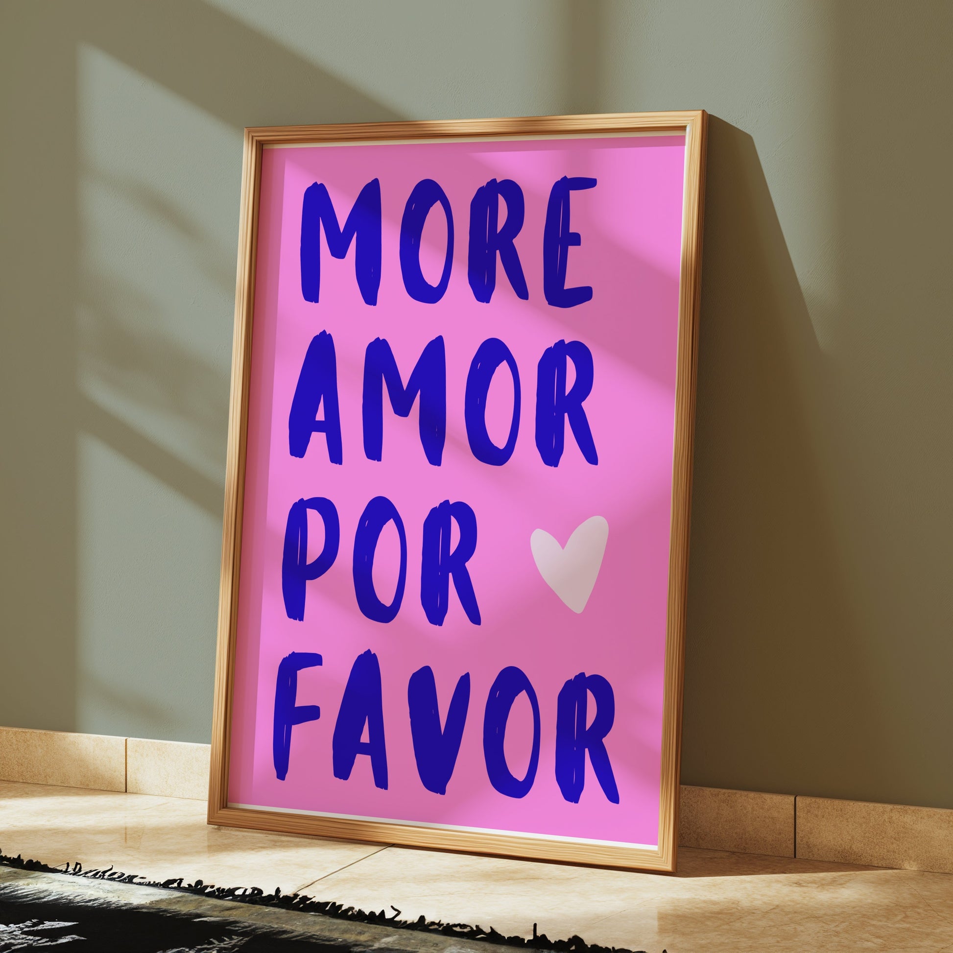 Premium Poster of More Amor Por Favor Blue Text Pink Background Posters