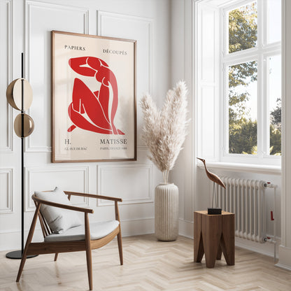 Henri Matisse 'Papiers Découpés' poster framed and displayed in a modern living room with neutral tones and minimalist furniture.