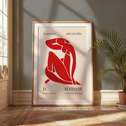 Henri Matisse 'Papiers Découpés' poster framed and styled in a sunlit room with green accents, perfect for modern wall decor.