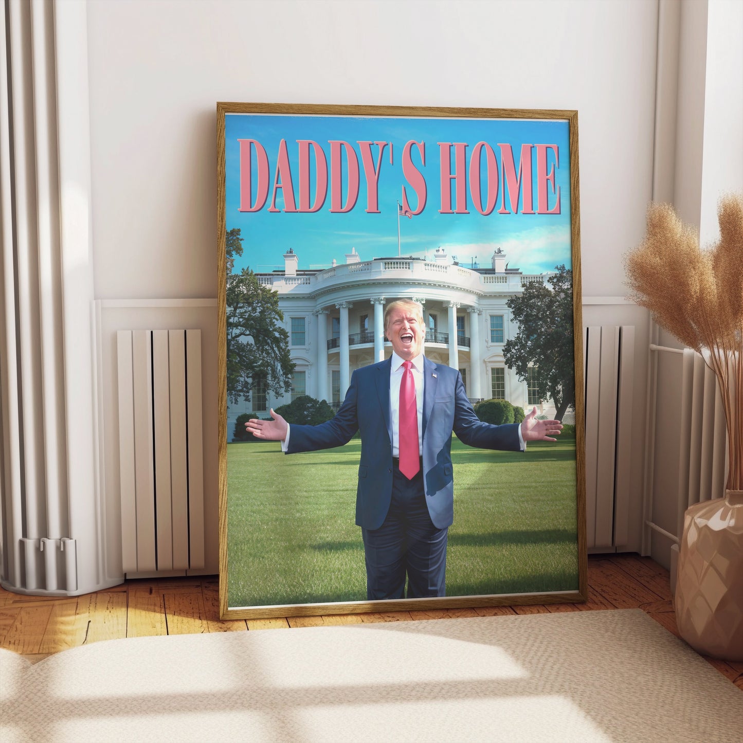 President Donald Trump Daddy's Home poster in a wooden frame, propped on the floor in a sunlit room, perfect for adding a playful political touch.