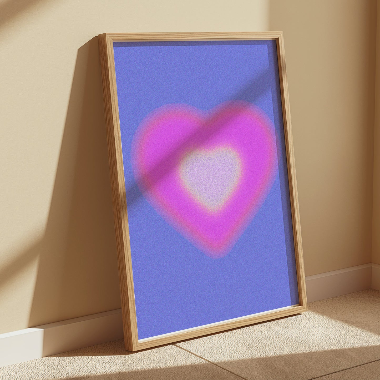 Premium Poster of Radiant Pink Heart with Blue Background Posters