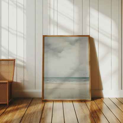Premium Poster of Serene Beach Scene with Cloudy Sky and Flying Birds Posters