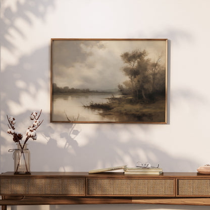 Premium Poster of Serene Riverbank Scene with Trees and Misty Atmosphere Posters