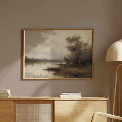 Premium Poster of Serene Riverbank Scene with Trees and Misty Atmosphere Posters