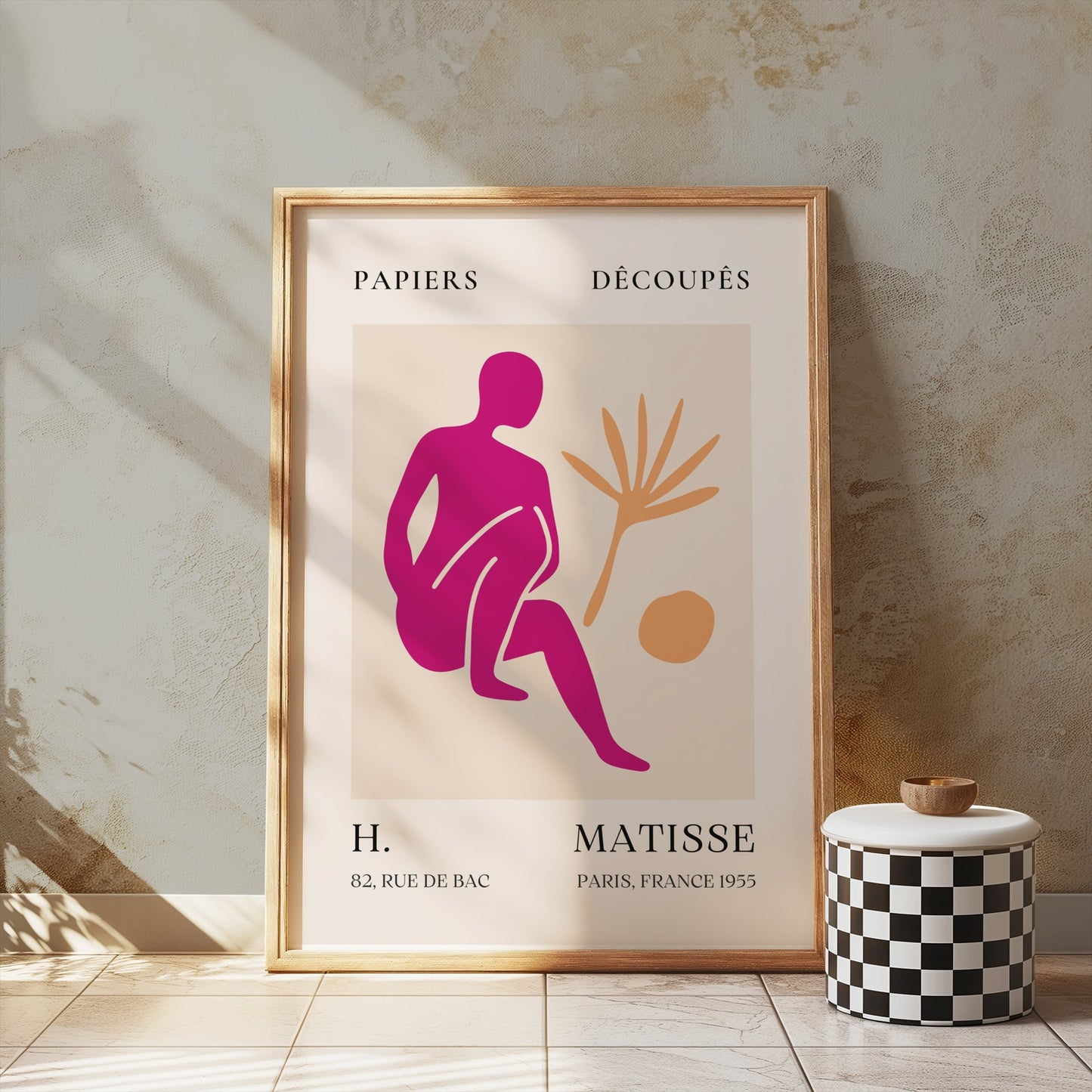 Framed Henri Matisse inspired art print poster displayed on a wooden table with natural light, showcasing modern abstract design for home decor.