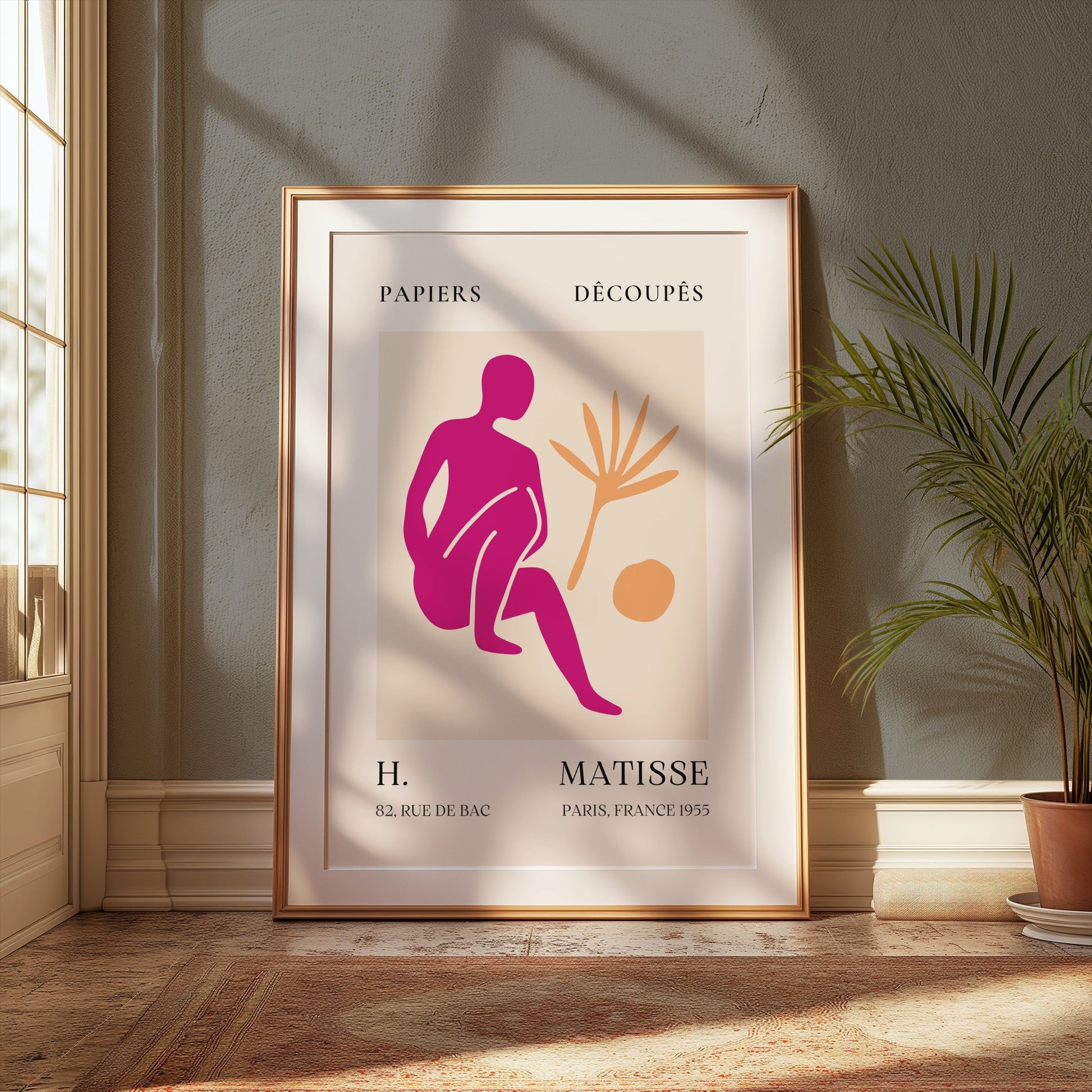 Henri Matisse inspired art print poster in a gold frame, leaning against a green wall with sunlight, ideal for modern wall decor.