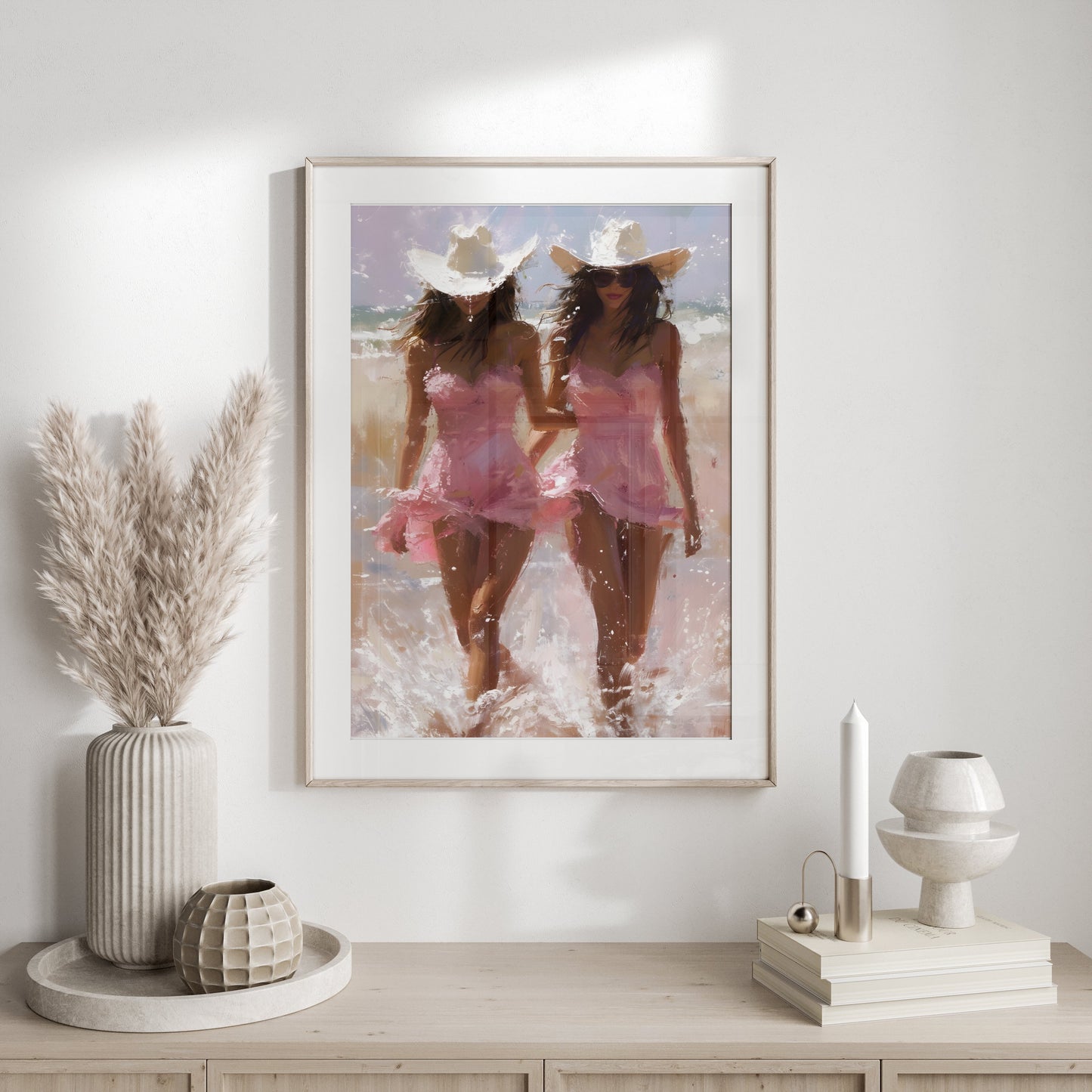 Premium Poster of Two Women in Pink Dresses with Cowboy Hats on Beach Posters