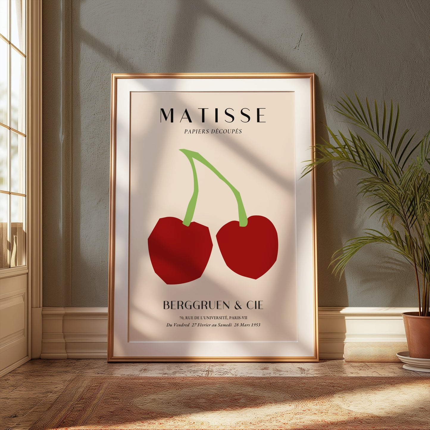 Framed vintage Henri Matisse art print poster with red cherries, displayed in a sunlit room with modern decor, perfect for minimalist wall art.