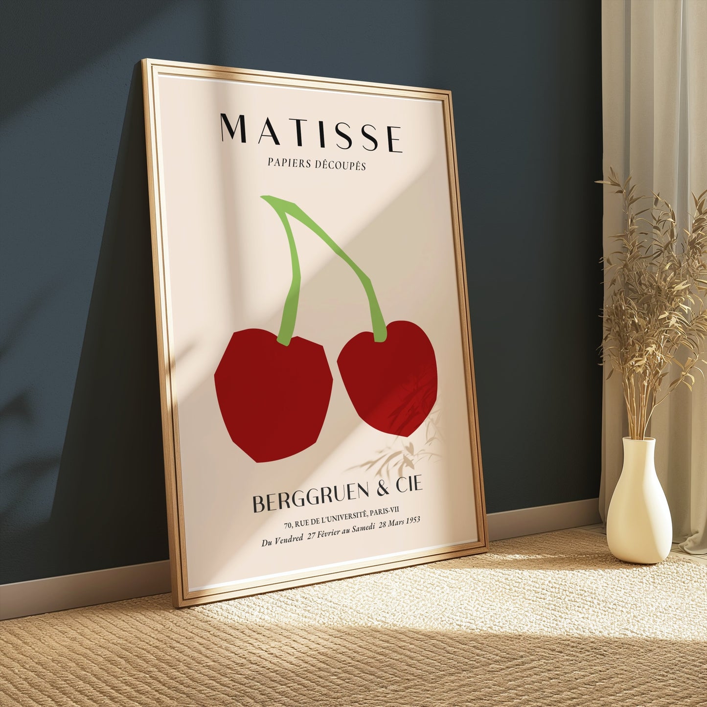 Henri Matisse cherry art print leaning against a dark teal wall, styled with natural light and minimalist decor for modern art enthusiasts.