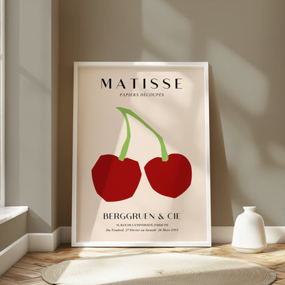 Framed Henri Matisse cherry art print poster displayed in a modern room with neutral tones and minimalist decor, ideal for art lovers.