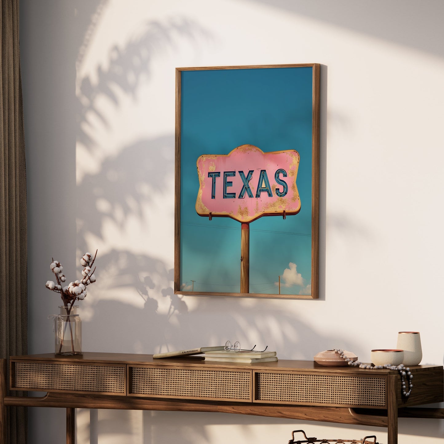 Vintage Texas retro sign wall art framed and styled on a wooden console table with decorative accents in a bright room.