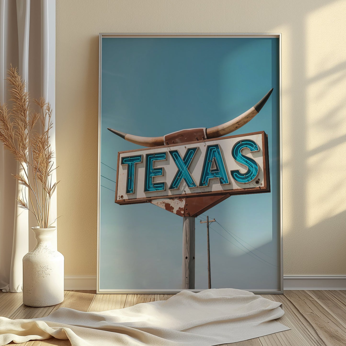 Vintage Texas roadside sign art print in a frame, styled on the floor with soft natural light and neutral decor accents.
