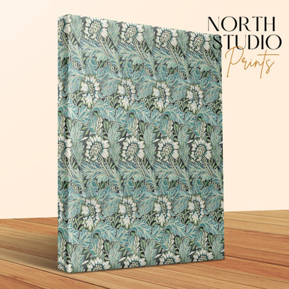 William Morris floral canvas wrap with intricate botanical patterns, displayed on a wooden surface with North Studio Prints branding.