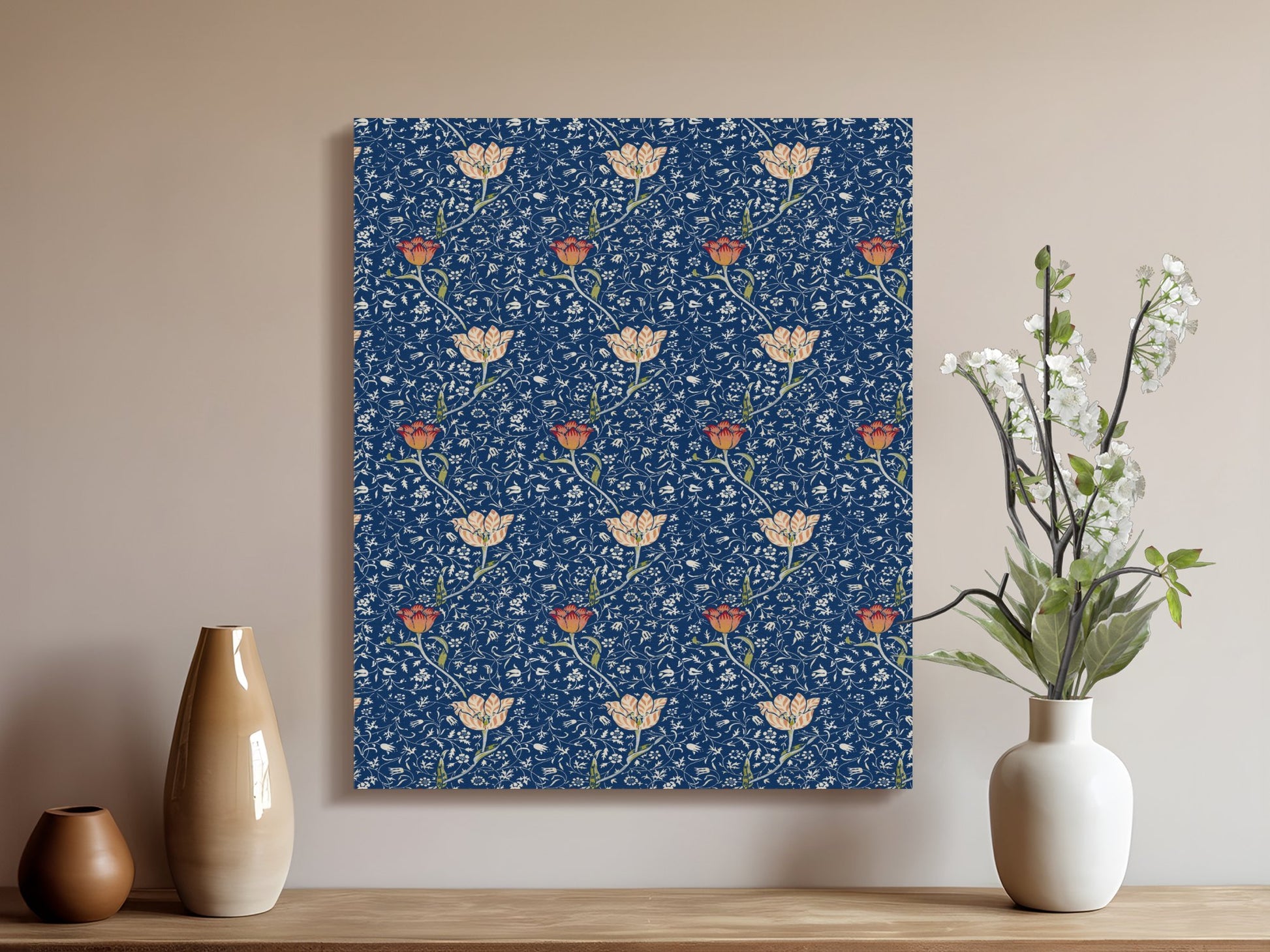 Elegant William Morris floral canvas wrap displayed on a beige wall, styled with vases and white flowers for classic home decor.