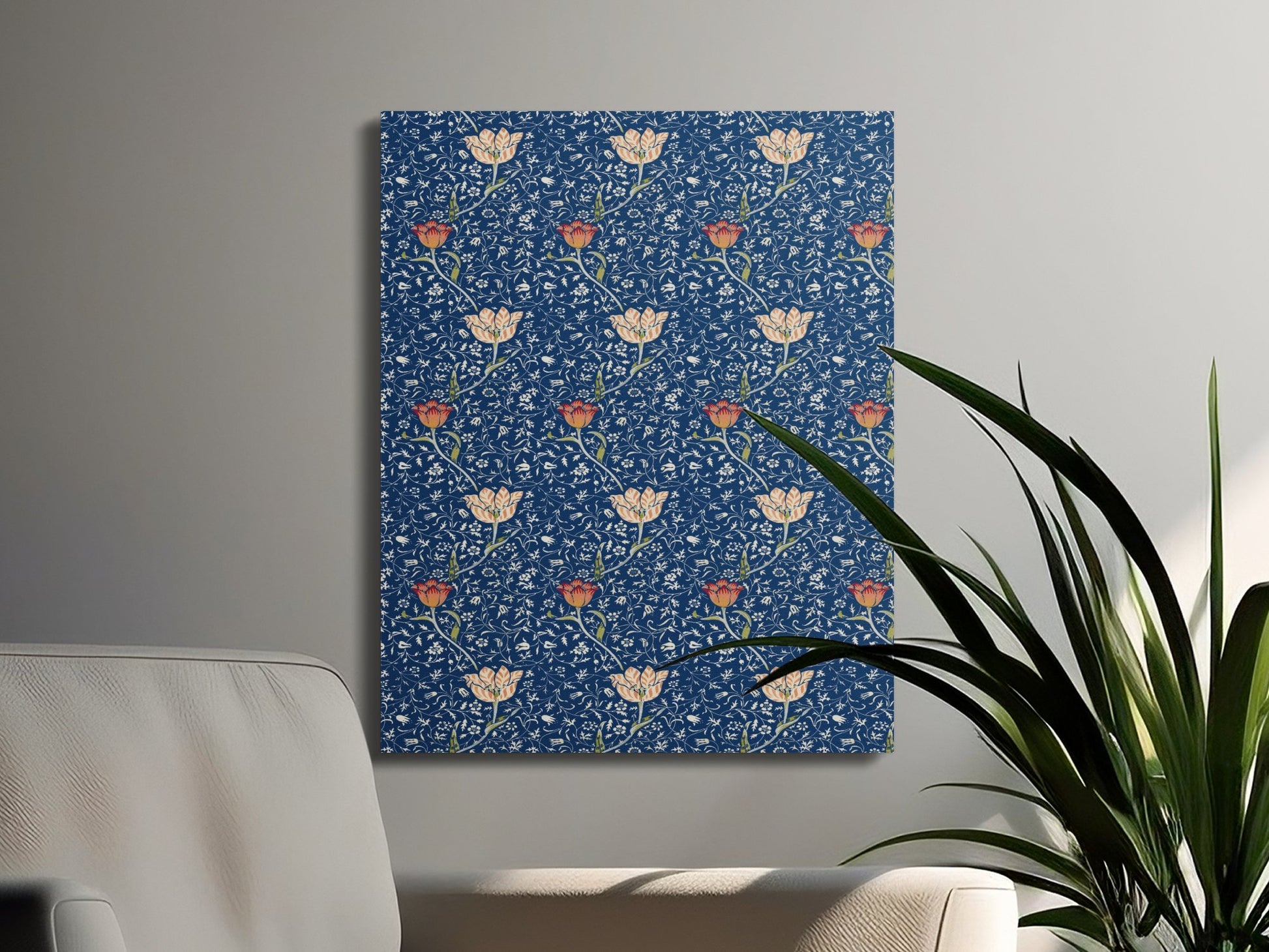 William Morris floral canvas wrap with blue and orange botanical design, styled in a modern living room with green plants and neutral furniture.