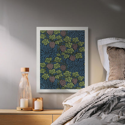 William Morris Grape Vines canvas wall art styled in a cozy bedroom with neutral bedding, candles, and soft lighting for a vintage decor touch.