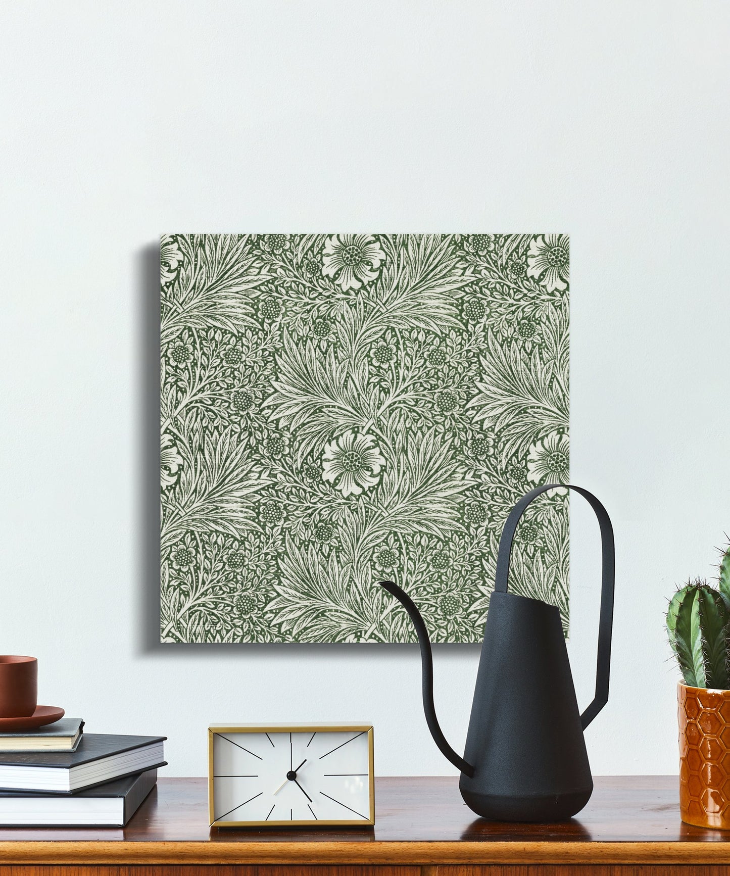 William Morris green floral pattern canvas wrap placed on a desk with modern decor, blending eco-friendly art with functional workspace design.