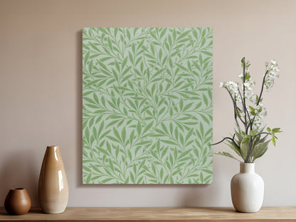 William Morris green leaf pattern canvas wrap styled on a wooden shelf with vases and flowers, perfect for botanical wall art.