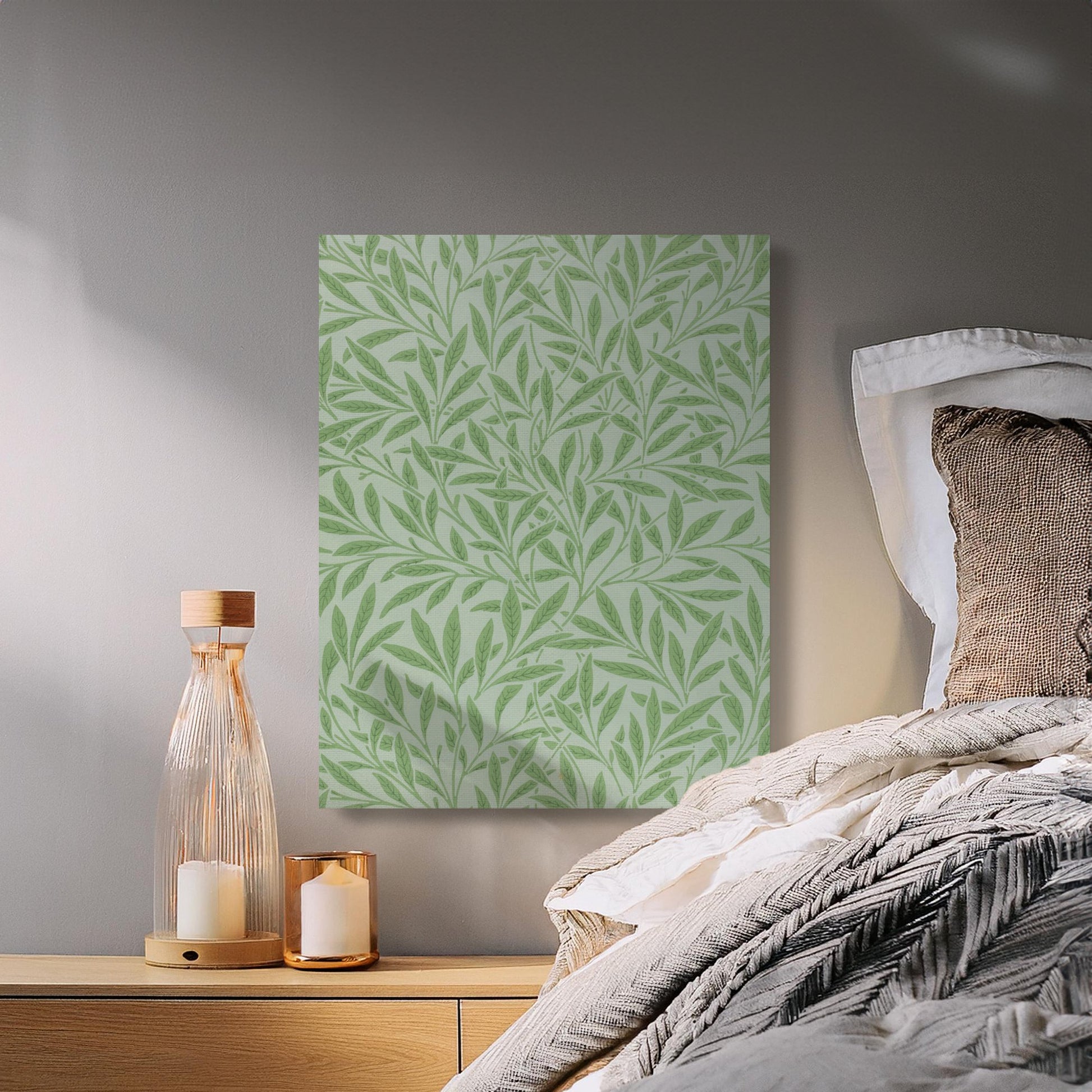 William Morris green leaf pattern canvas wrap hung above a cozy bed, adding a touch of nature-inspired elegance to bedroom decor.