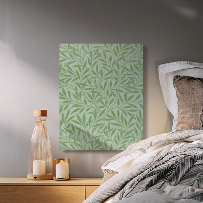 William Morris green leaf pattern canvas wrap hung above a cozy bed, adding a touch of nature-inspired elegance to bedroom decor.