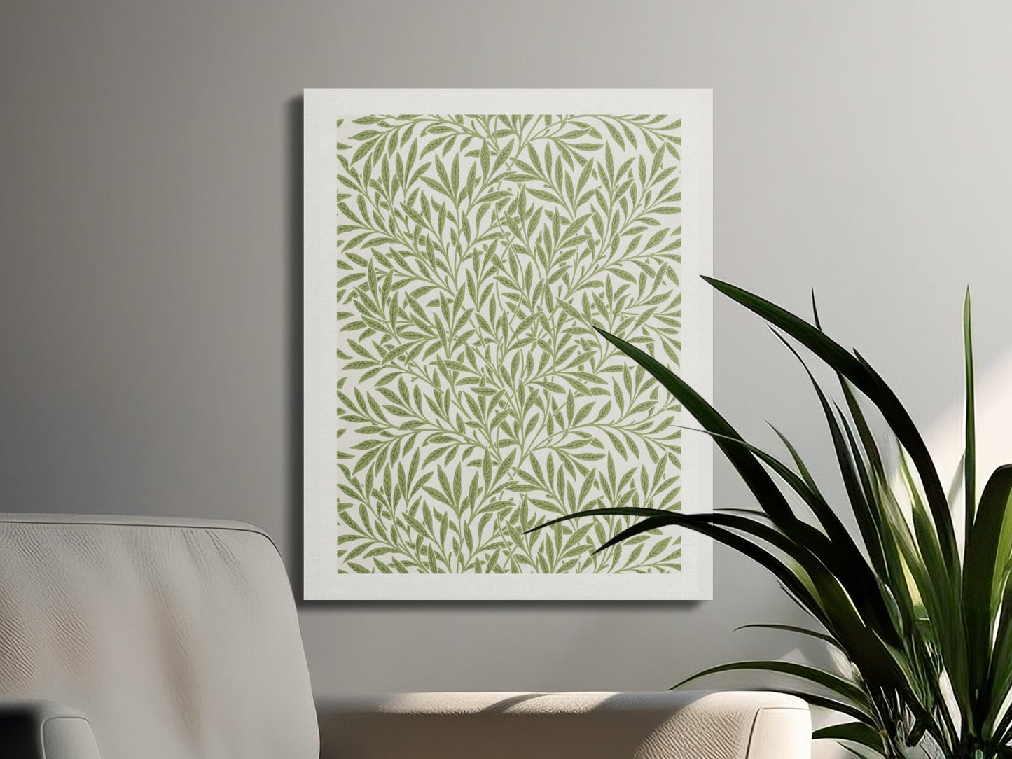William Morris leafy green pattern canvas wrap styled in a modern living room with a plant and neutral furniture, enhancing the natural theme.