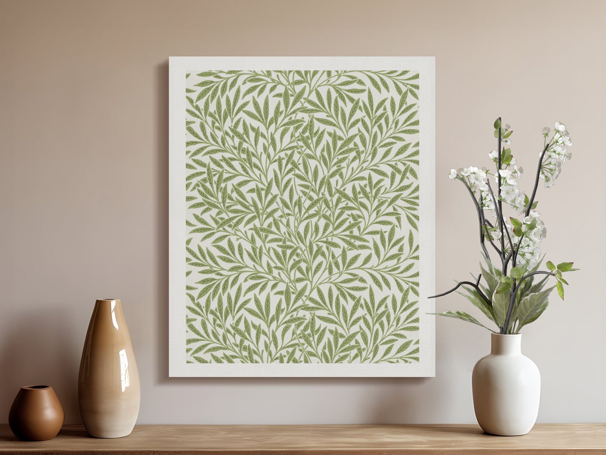 William Morris leafy green pattern canvas wrap on a beige wall, paired with vases and flowers, perfect for elegant home decor.