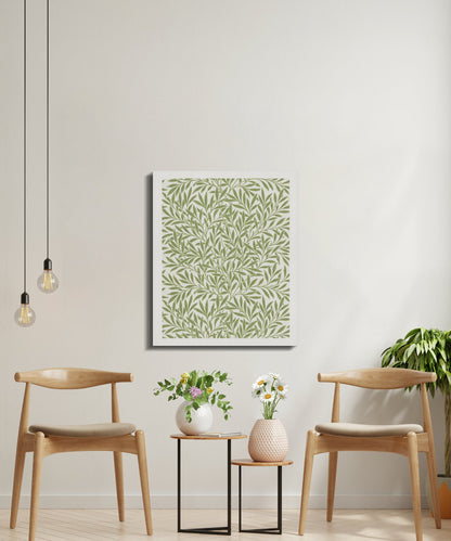 William Morris leafy green pattern canvas wrap in a bright sitting area with wooden chairs and plants, creating a serene atmosphere.