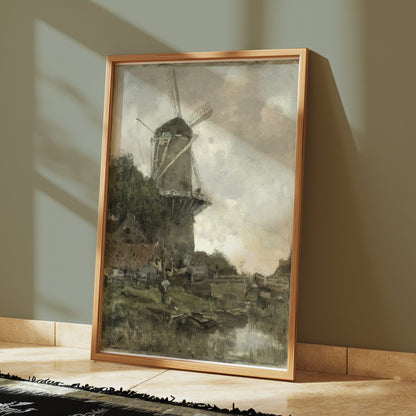 Premium Poster of Windmill Overlooking A Calm River Bank Posters