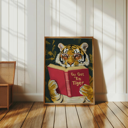 Tiger wearing glasses reads a red book titled "Go Get 'Em Tiger".