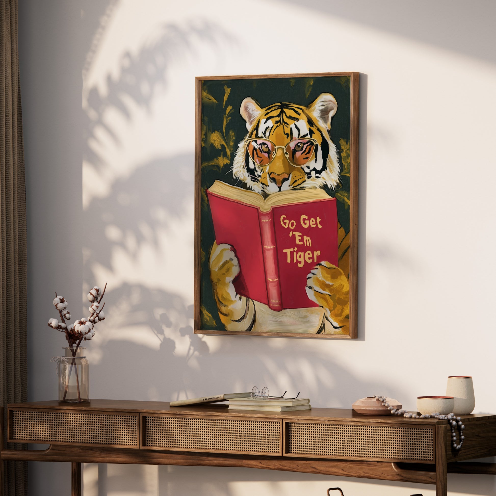 Tiger wearing sunglasses reads a book with "Go Get 'Em Tiger" text.