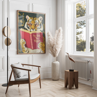 Framed tiger artwork with glasses reading "Go Get 'Em Tiger" hangs above chair.